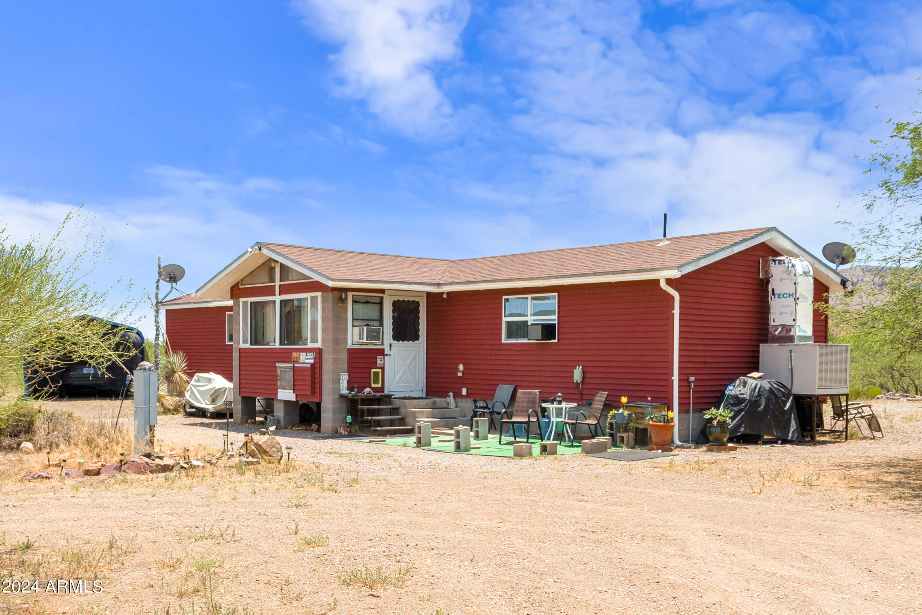 4500 Highway 80 Douglas, AZ 85607 - Photo 2 of 40 a front view of a house with a yard