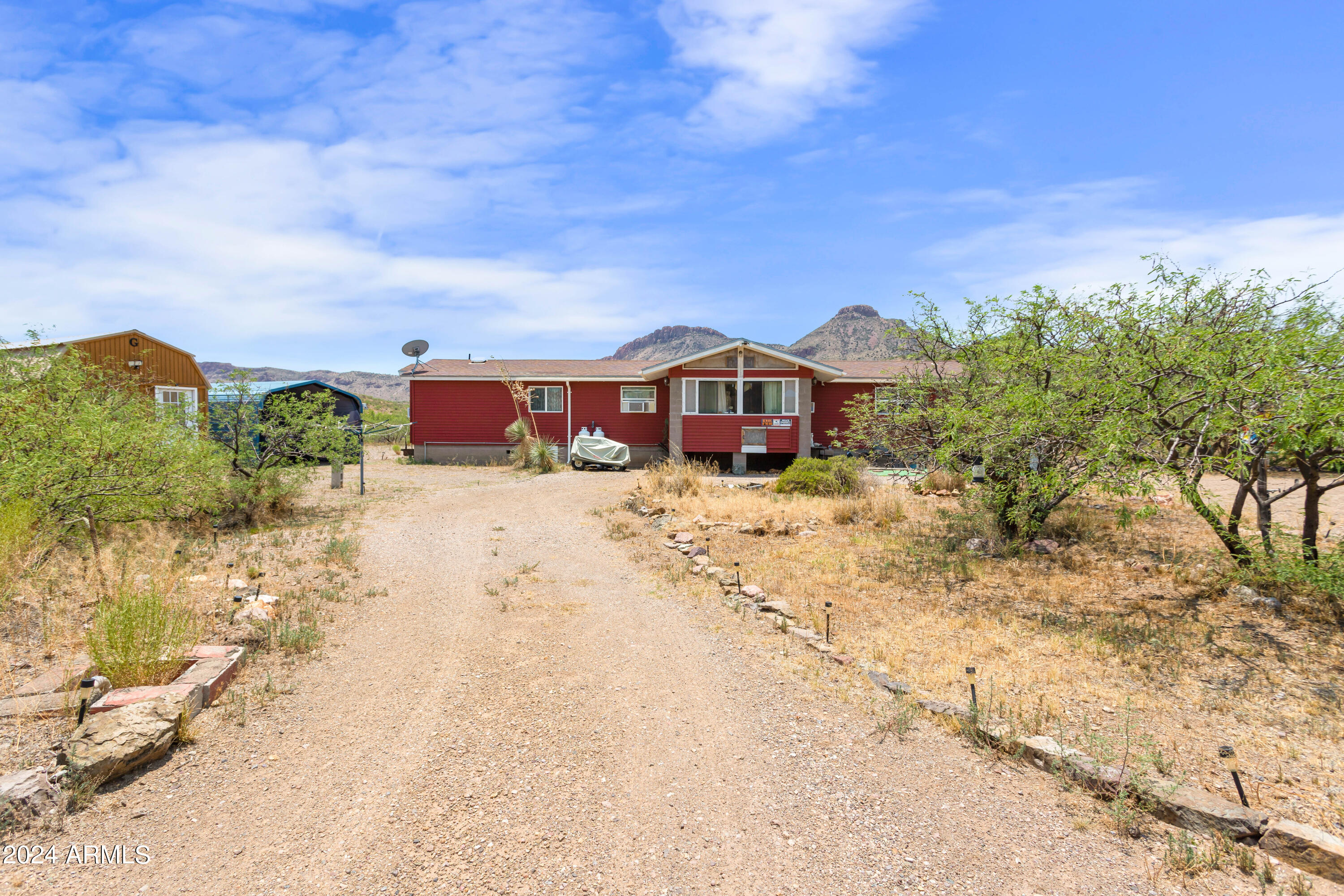 4500 Highway 80 Douglas, AZ 85607 - Photo 32 of 40 a view of a large white house in front of yard