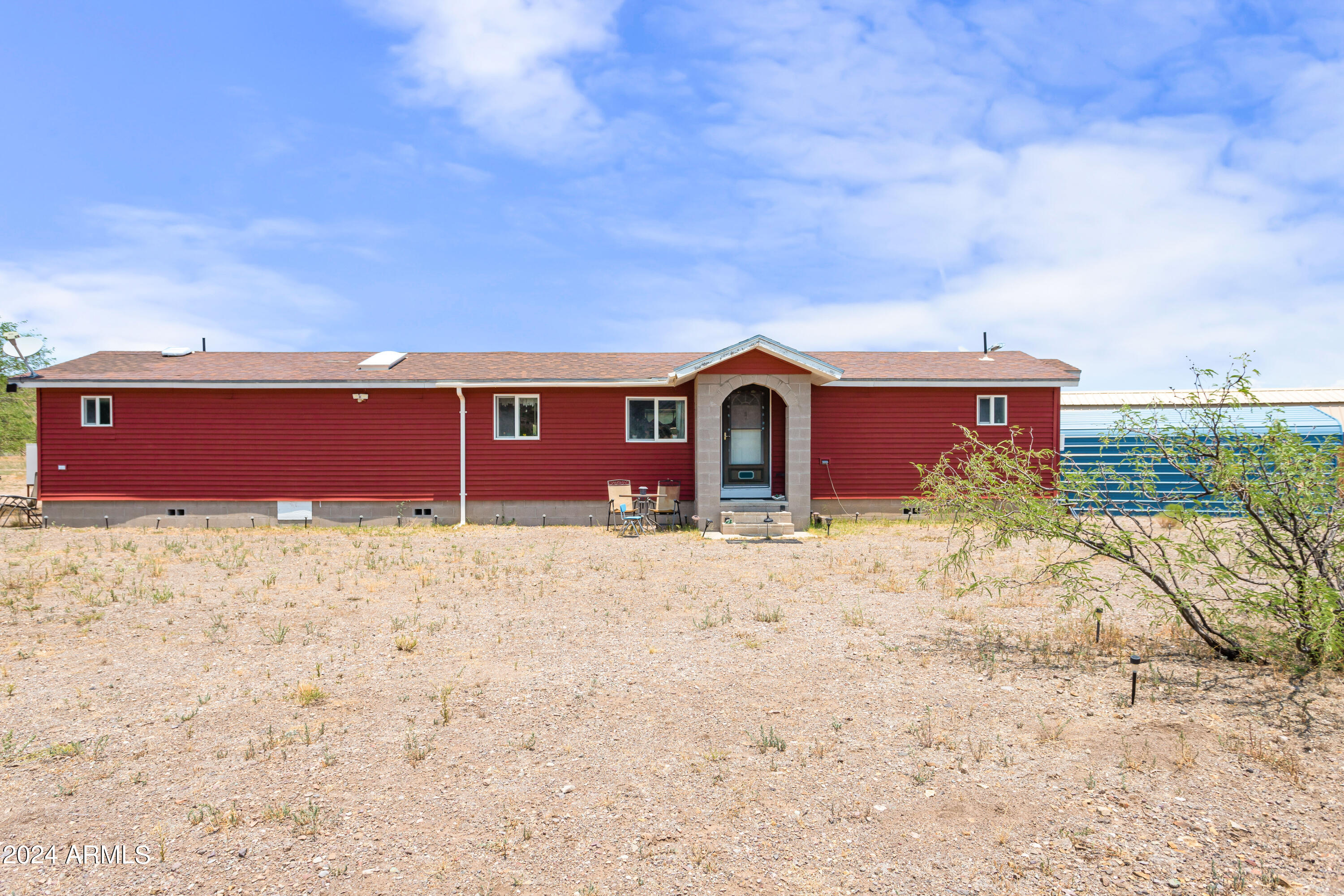 4500 Highway 80 Douglas, AZ 85607 - Photo 38 of 40 a front view of a house with a yard