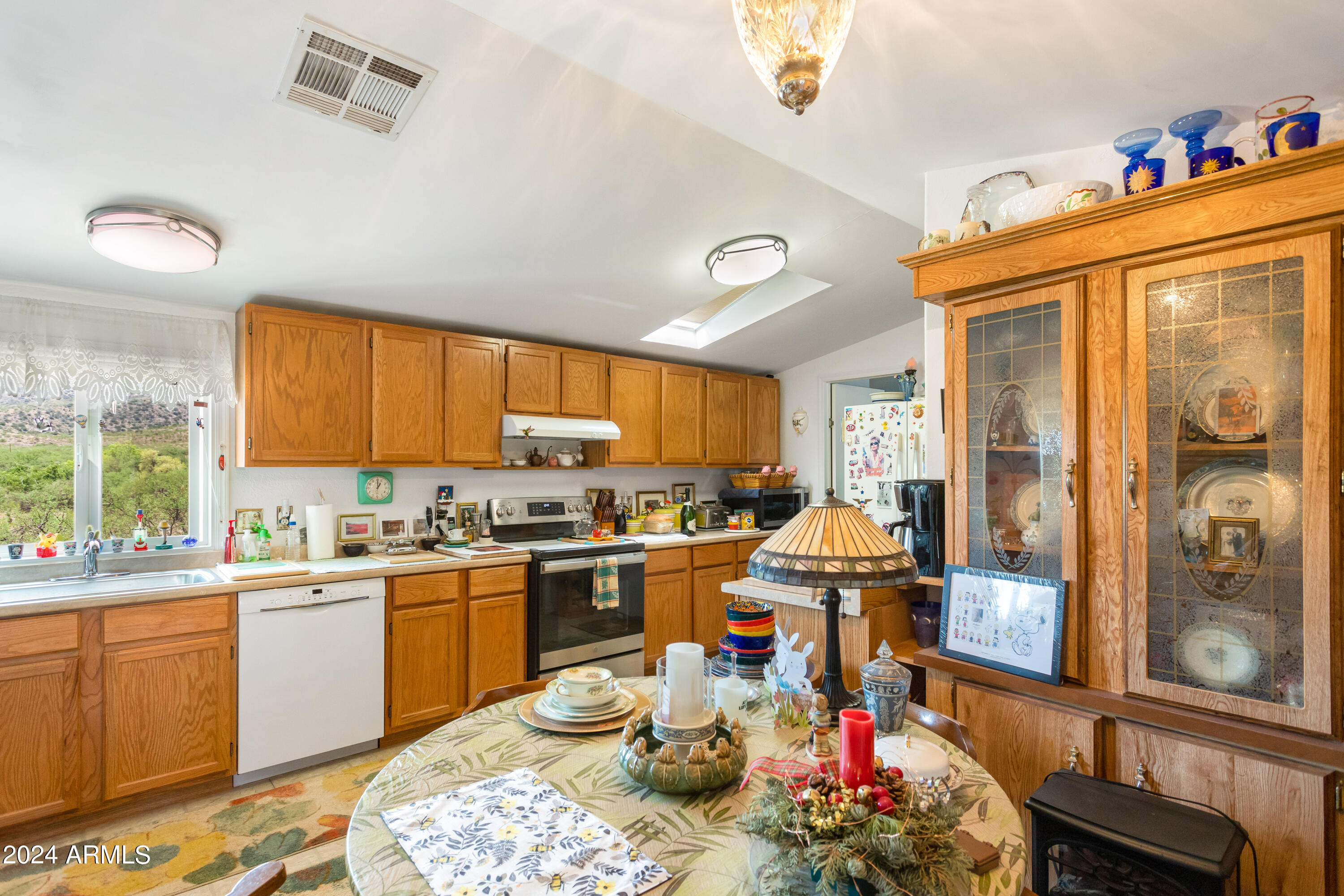 4500 Highway 80 Douglas, AZ 85607 - Photo 6 of 40 a kitchen with lots of appliances and cabinets