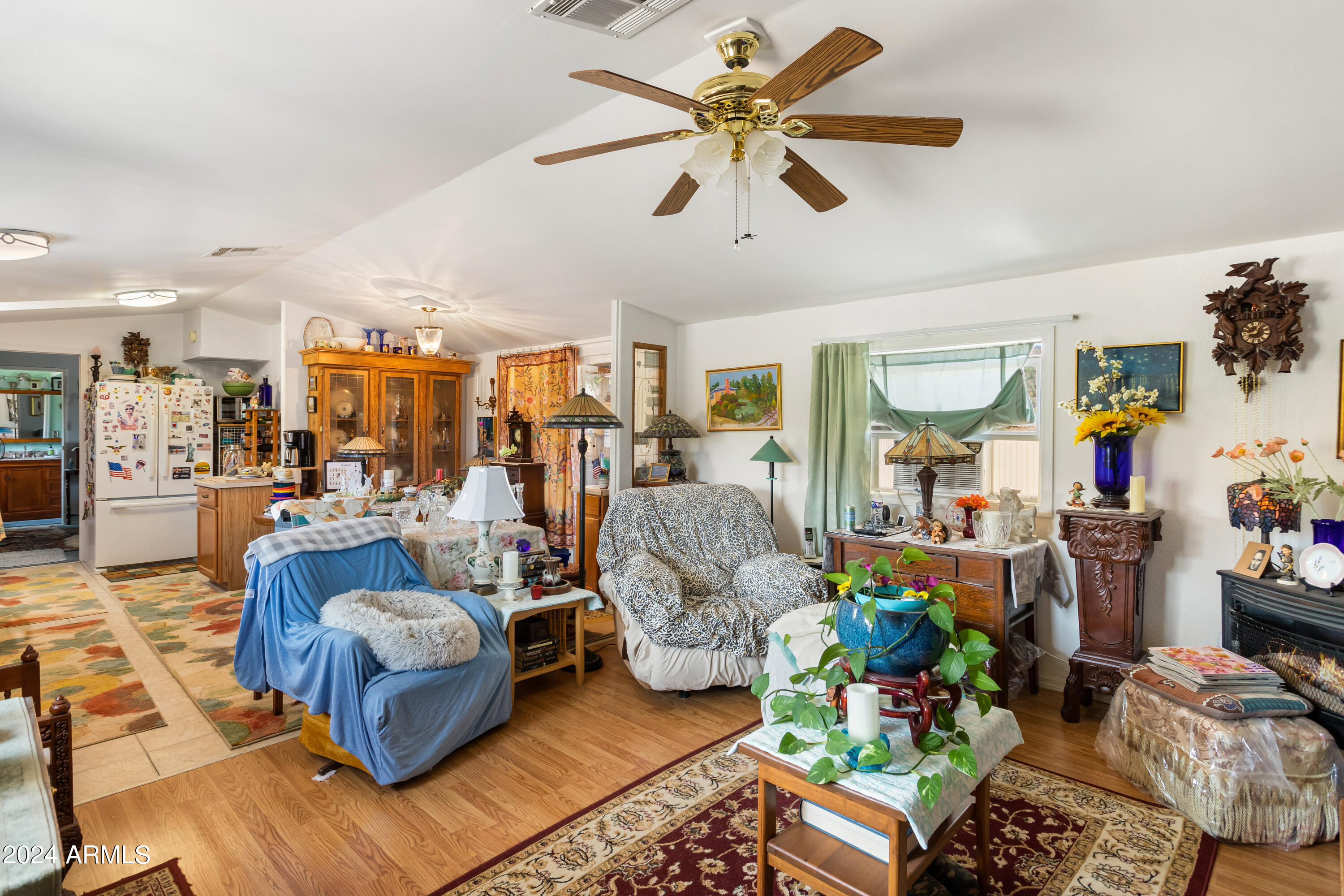 4500 Highway 80 Douglas, AZ 85607 - Photo 7 of 40 a living room filled with furniture and a chandelier
