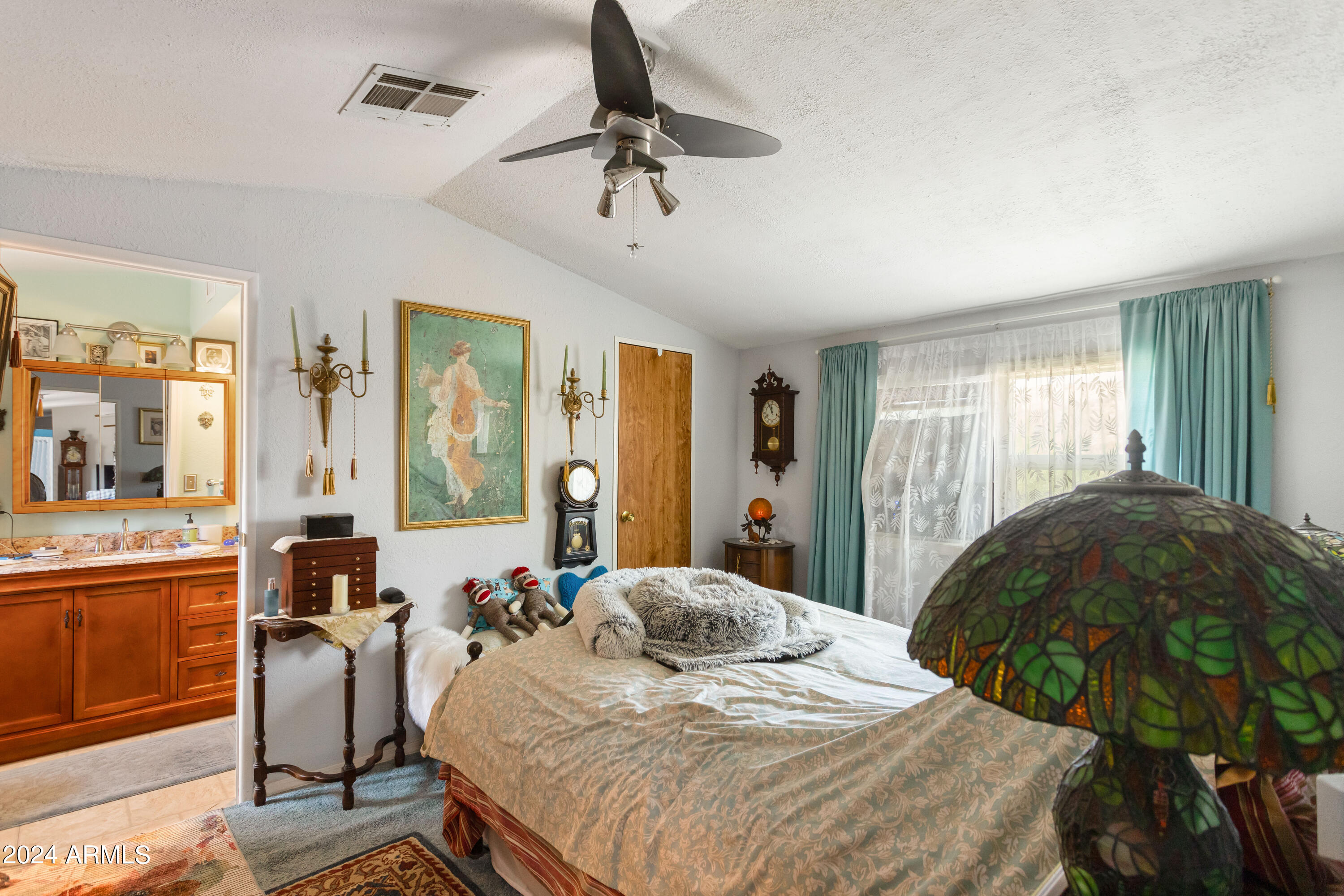 4500 Highway 80 Douglas, AZ 85607 - Photo 10 of 40 a bedroom with a bed and wooden floor