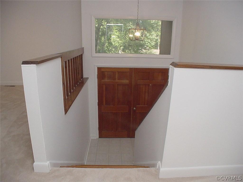 7905 Stiles Road North Chesterfield, VA 23235 - Photo 2 of 47 Entrance foyer has ceramic tile and wood steps