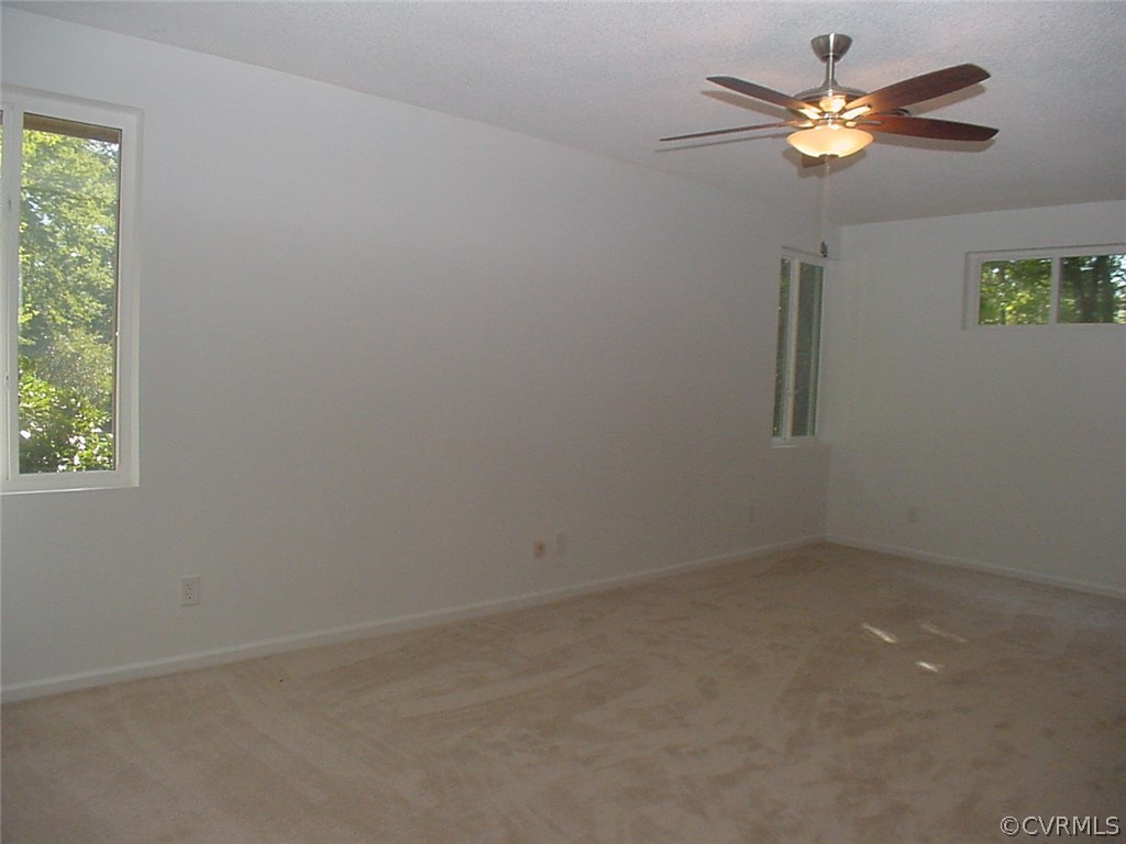 7905 Stiles Road North Chesterfield, VA 23235 - Photo 28 of 47 4th bedroom has 3 windows and a ceiling fan