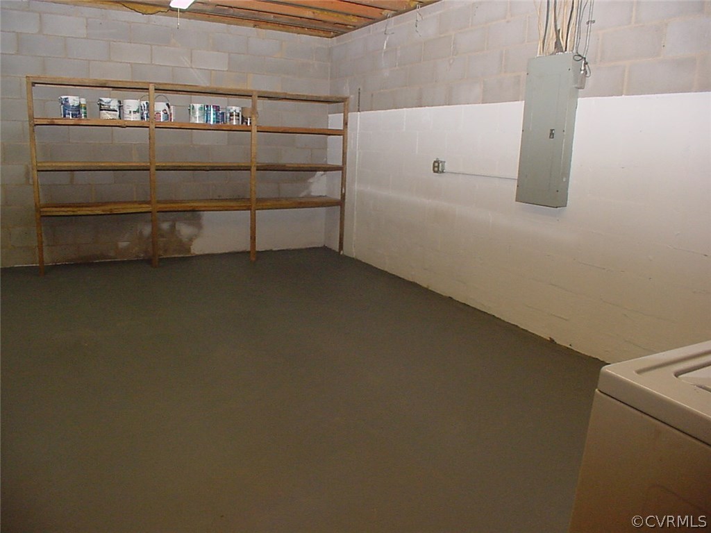7905 Stiles Road North Chesterfield, VA 23235 - Photo 32 of 47 Laundry room has shelving & lots of space for hobb