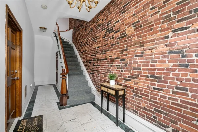 a view of a street with cars