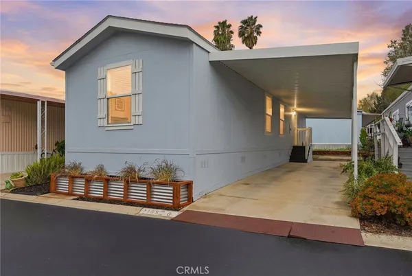 a house view with a outdoor space