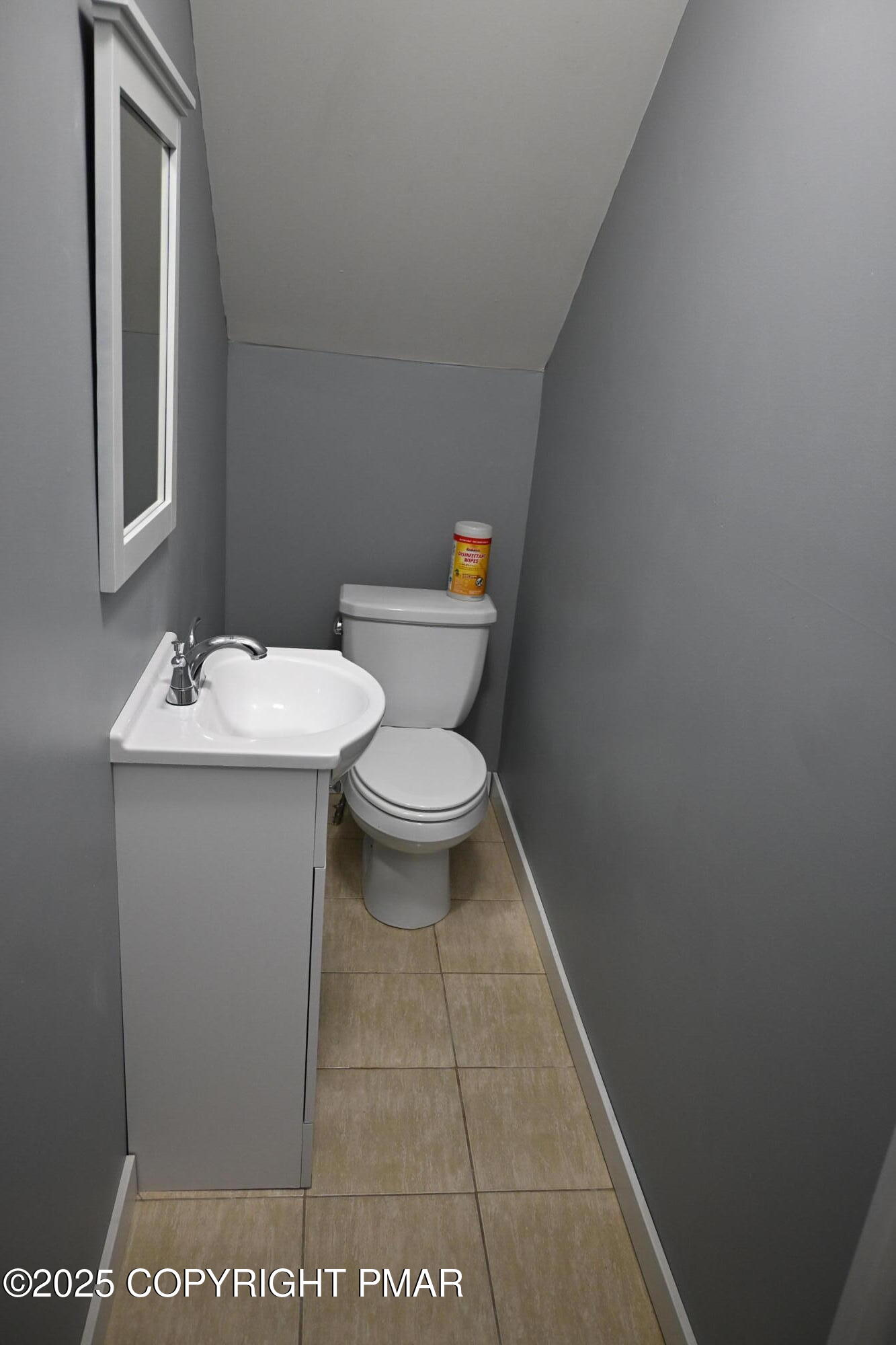 222 Nadine Boulevard Pocono Summit, PA 18346 - Photo 15 of 16 a white toilet sitting next to a bathroom sink