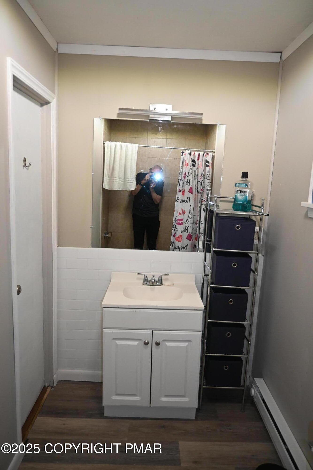 222 Nadine Boulevard Pocono Summit, PA 18346 - Photo 9 of 16 a bathroom with a sink and a mirror