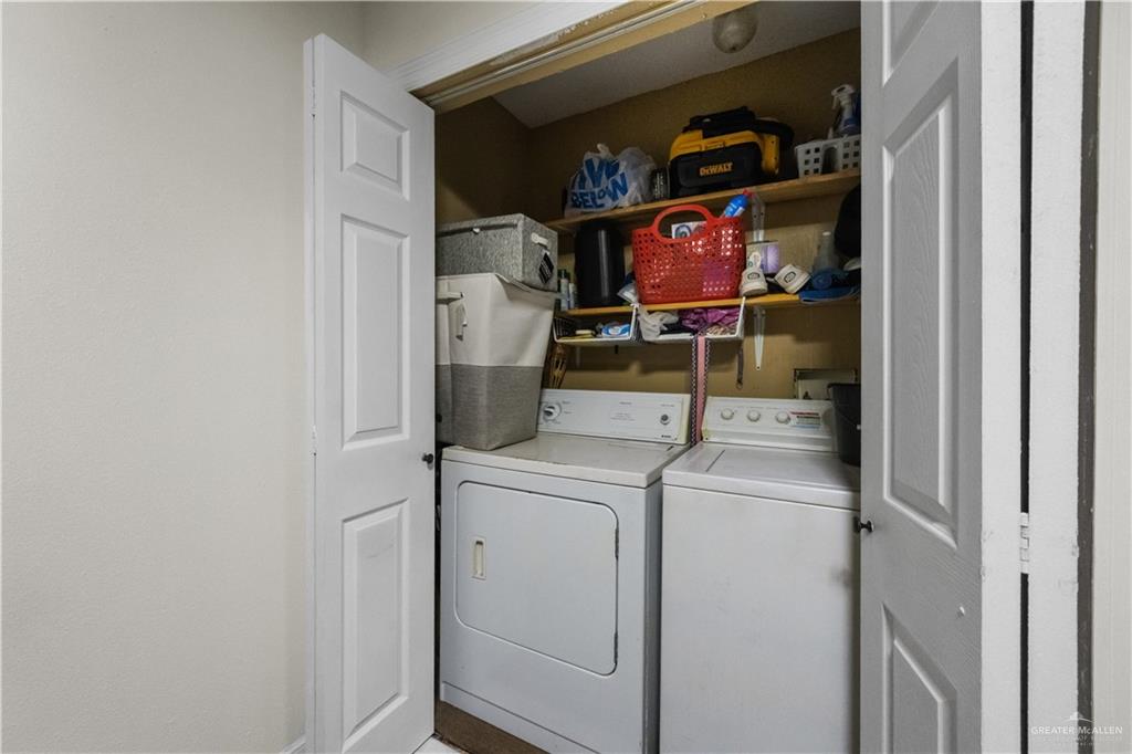 15501 East Davis Road Edinburg, TX 78542 - Photo 13 of 20 Dedicated laundry area featuring a washer and dryer within a bi-fold door closet