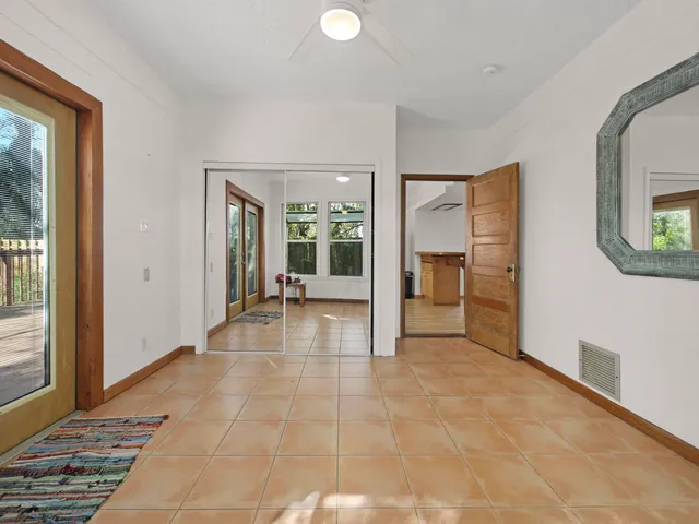 a view of livingroom with furniture and windows