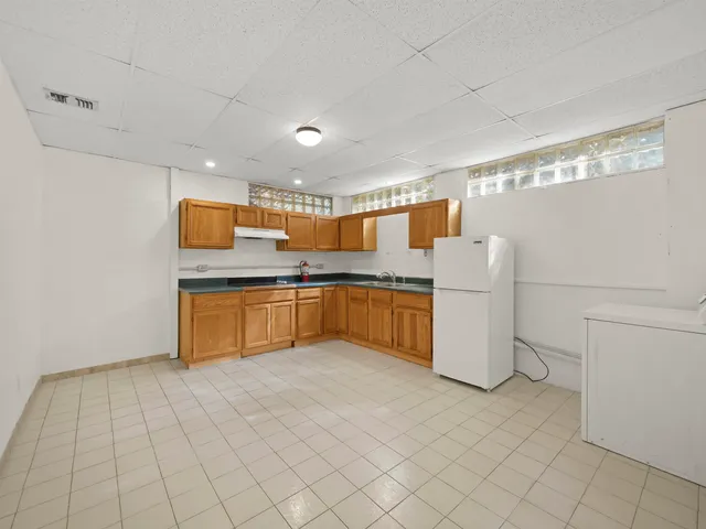 a kitchen with a cabinets