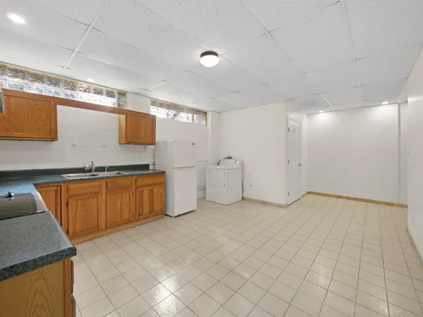 a view of a kitchen with a sink