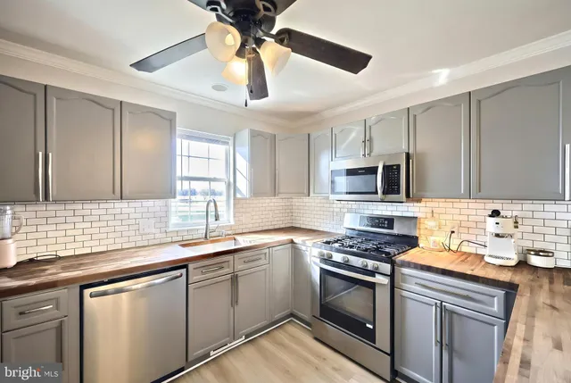 a living room with furniture and window