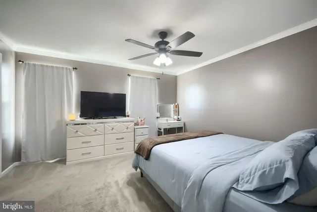 a bathroom with a double vanity sink and mirror