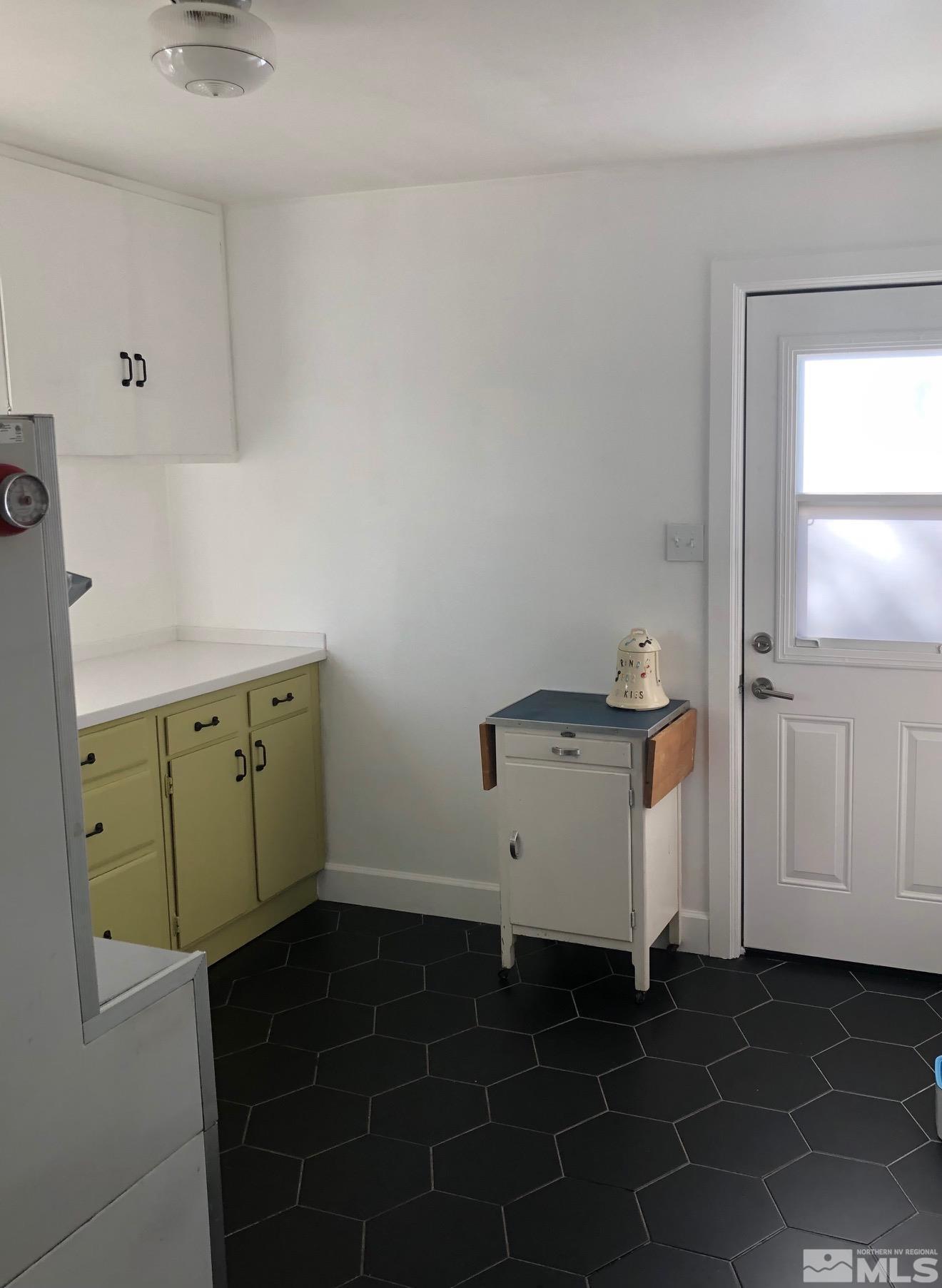380 Broadway Boulevard Reno, NV 89502 - Photo 19 of 28 a room with a cabinet and a window