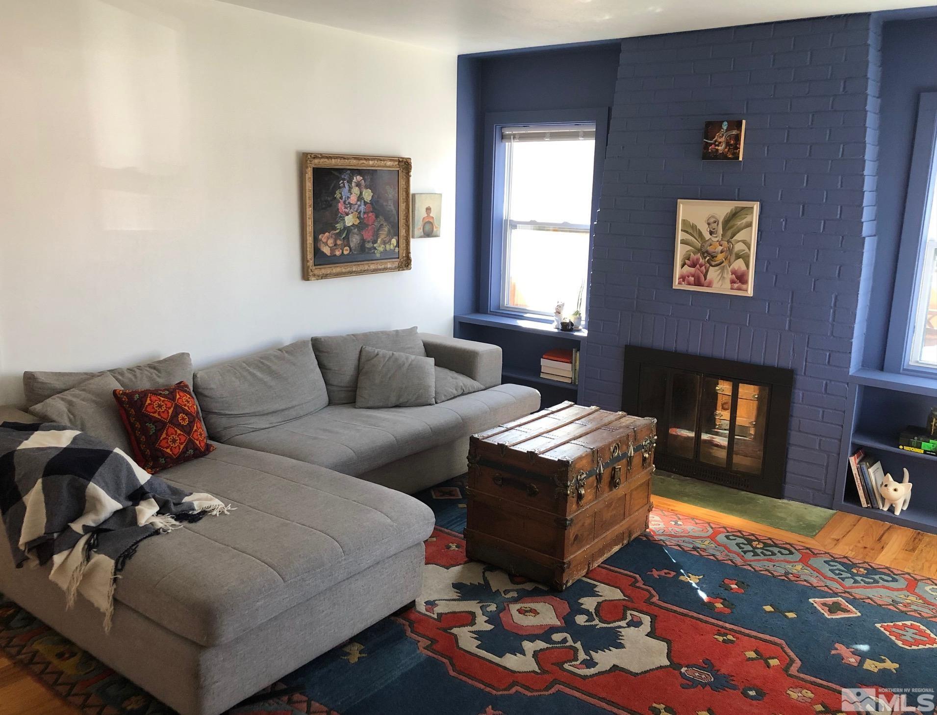 380 Broadway Boulevard Reno, NV 89502 - Photo 2 of 28 a living room with furniture and a fireplace
