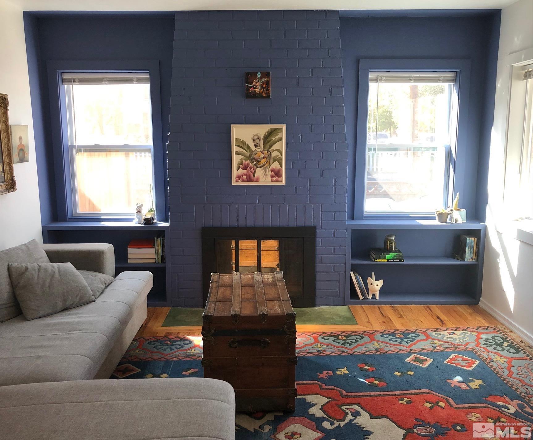 380 Broadway Boulevard Reno, NV 89502 - Photo 3 of 28 a living room with furniture and a fireplace