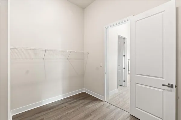 a view of small space with wooden floor