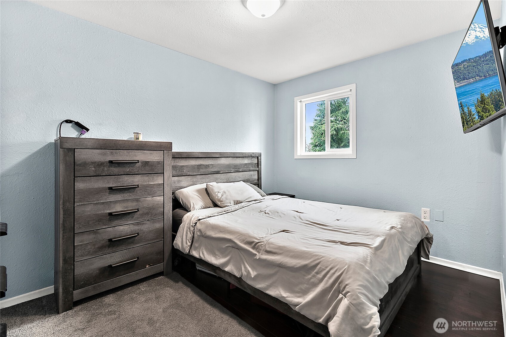 7308 Riverside Road East Sumner, WA 98390 - Photo 13 of 24 a bedroom with a bed and a window