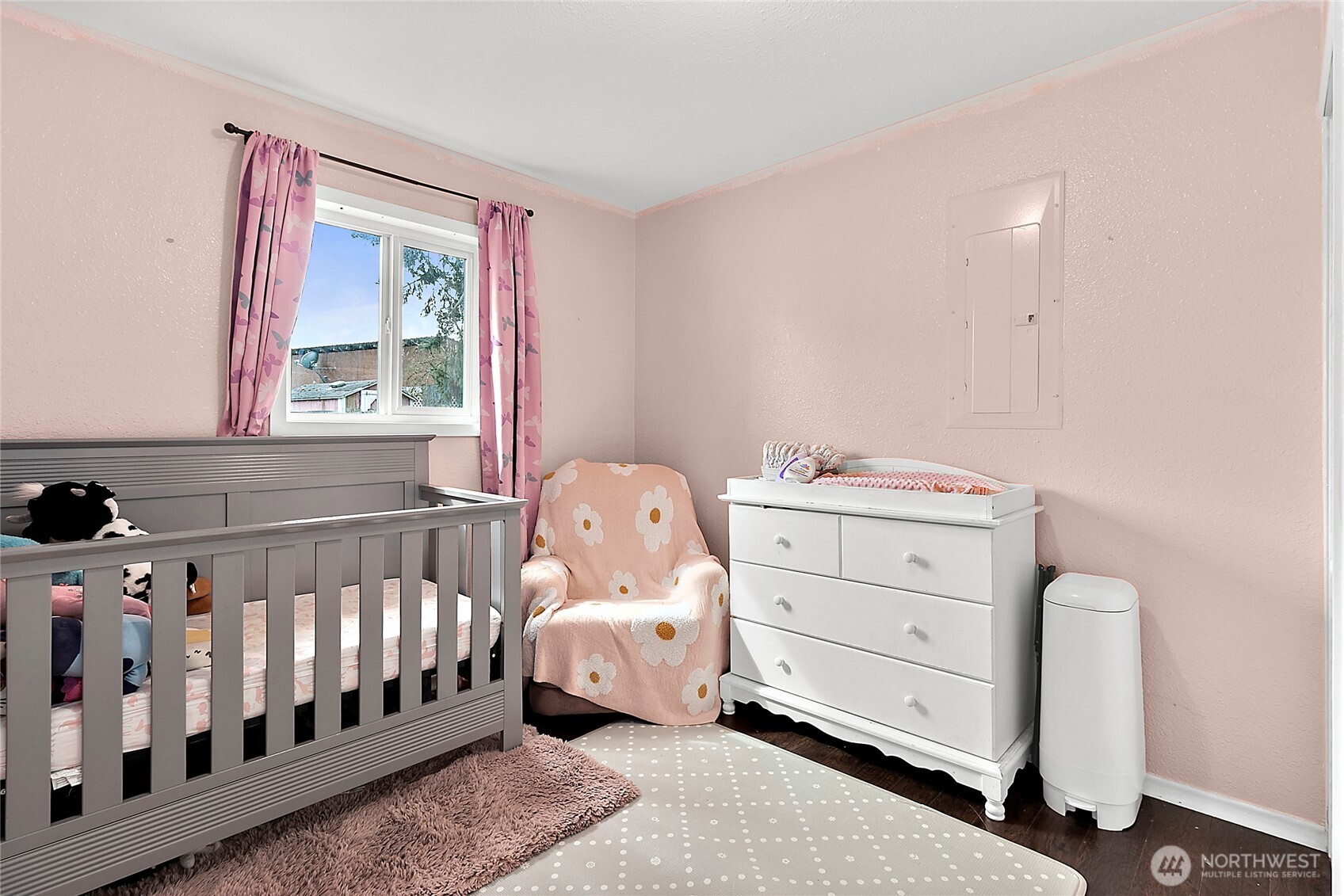 7308 Riverside Road East Sumner, WA 98390 - Photo 14 of 24 a bedroom with a baby bed baby crib and a window