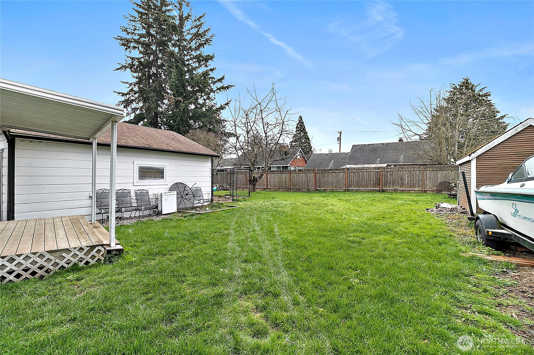 7308 Riverside Road East Sumner, WA 98390 - Photo 22 of 24 a view of a house with a yard