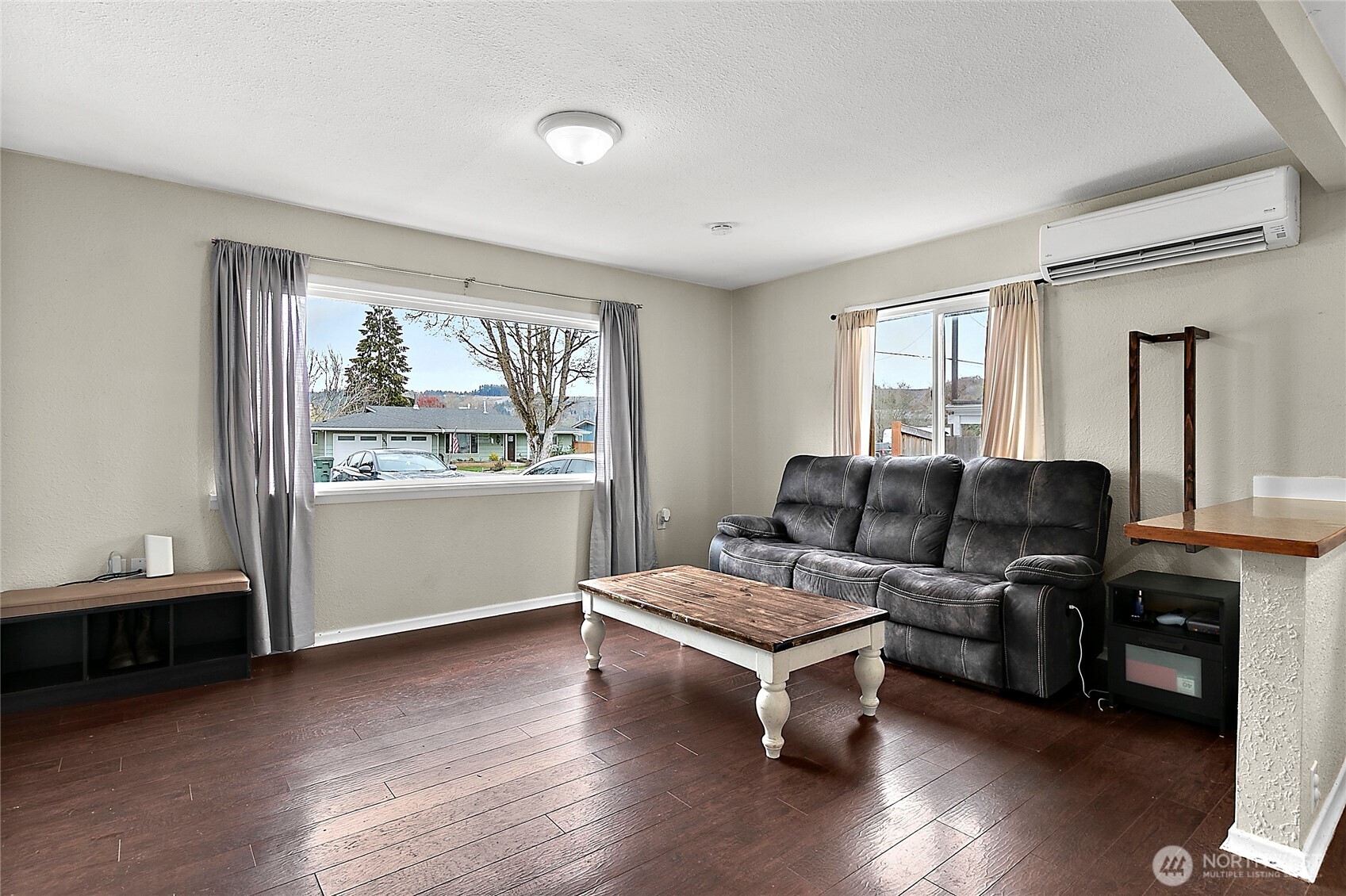 7308 Riverside Road East Sumner, WA 98390 - Photo 9 of 24 a living room with furniture and a window