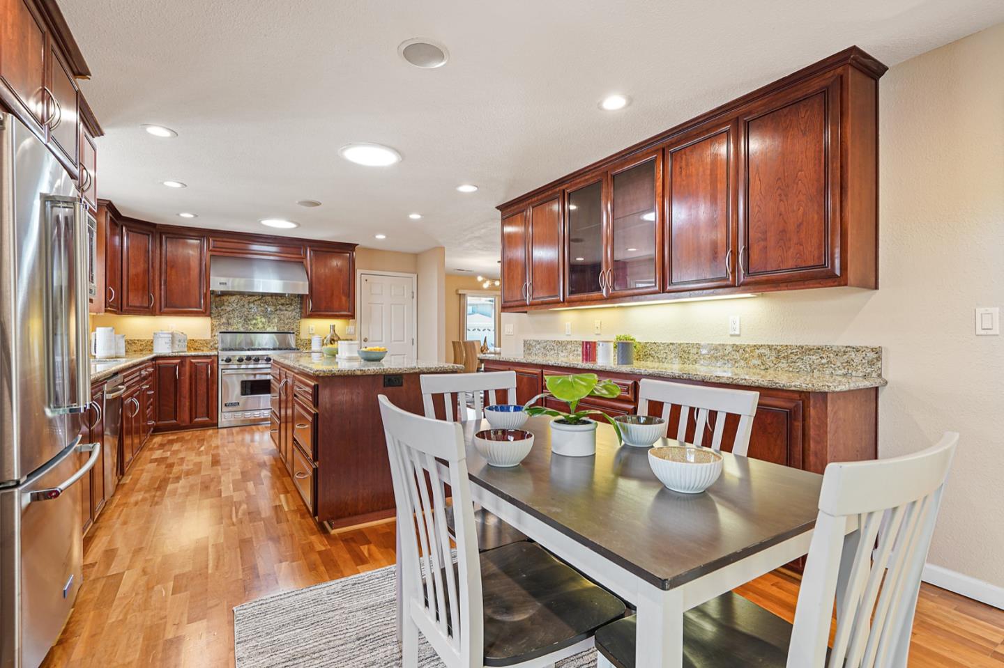 928 Lynn Court San Ramon, CA 94583 - Photo 12 of 43 a dinning room and kitchen with a large window