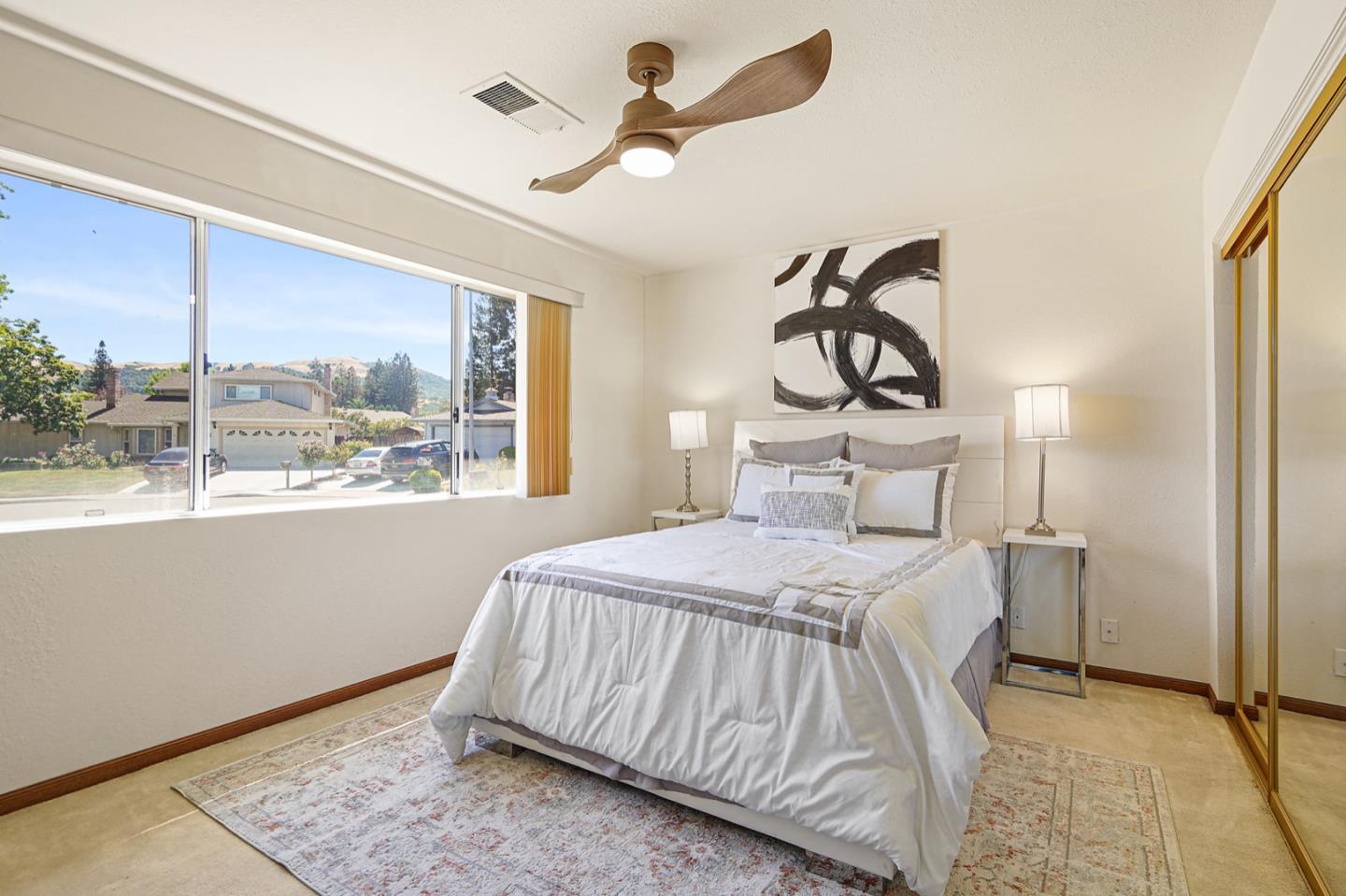 928 Lynn Court San Ramon, CA 94583 - Photo 19 of 43 a bedroom with a bed and window