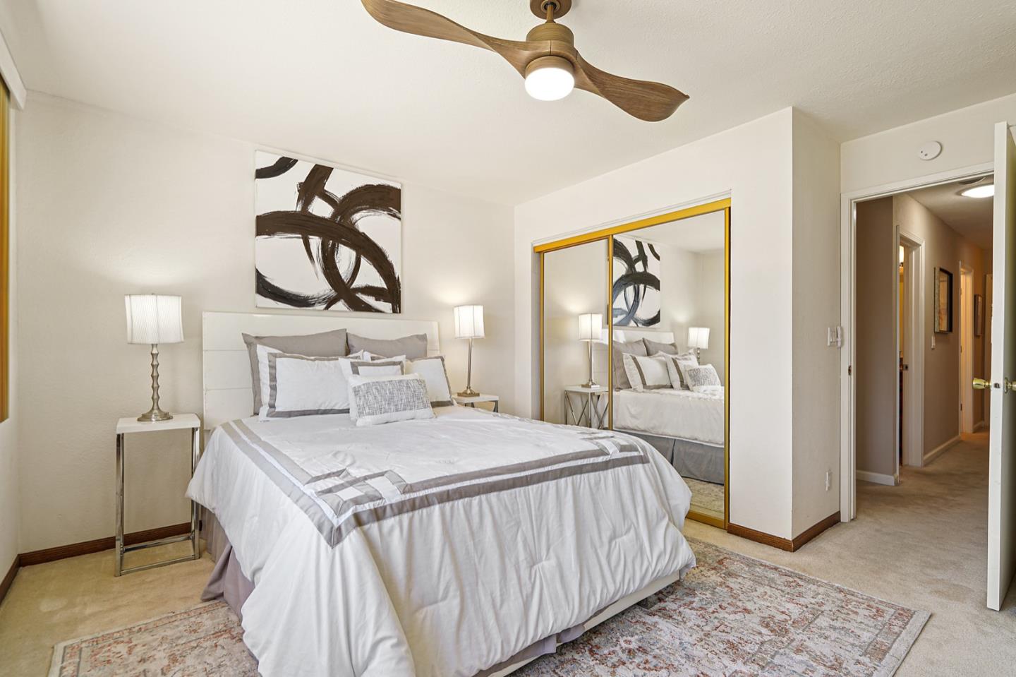 928 Lynn Court San Ramon, CA 94583 - Photo 20 of 43 a bedroom with a bed and a painting on the wall