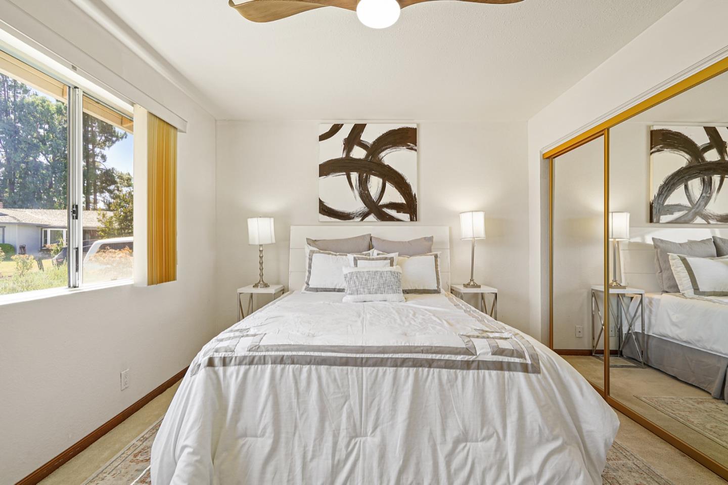 928 Lynn Court San Ramon, CA 94583 - Photo 21 of 43 a bedroom with a bed and wooden floor