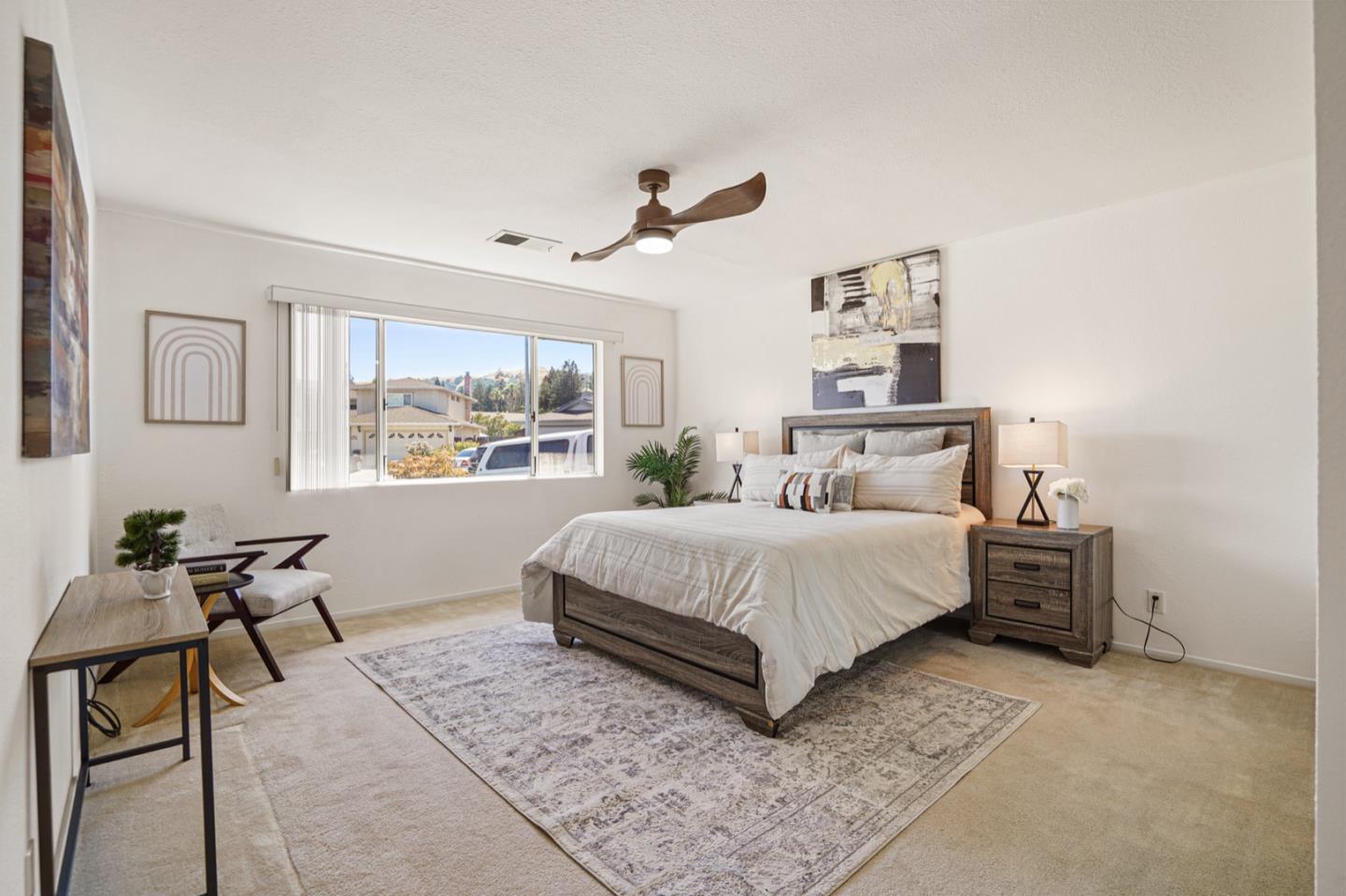 928 Lynn Court San Ramon, CA 94583 - Photo 22 of 43 a bedroom with a bed and a table in it