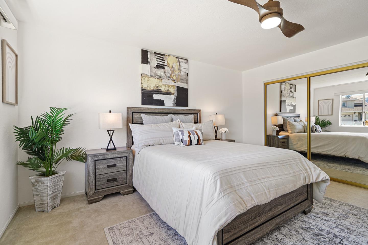 928 Lynn Court San Ramon, CA 94583 - Photo 23 of 43 a bedroom with a bed table flowerpot and window