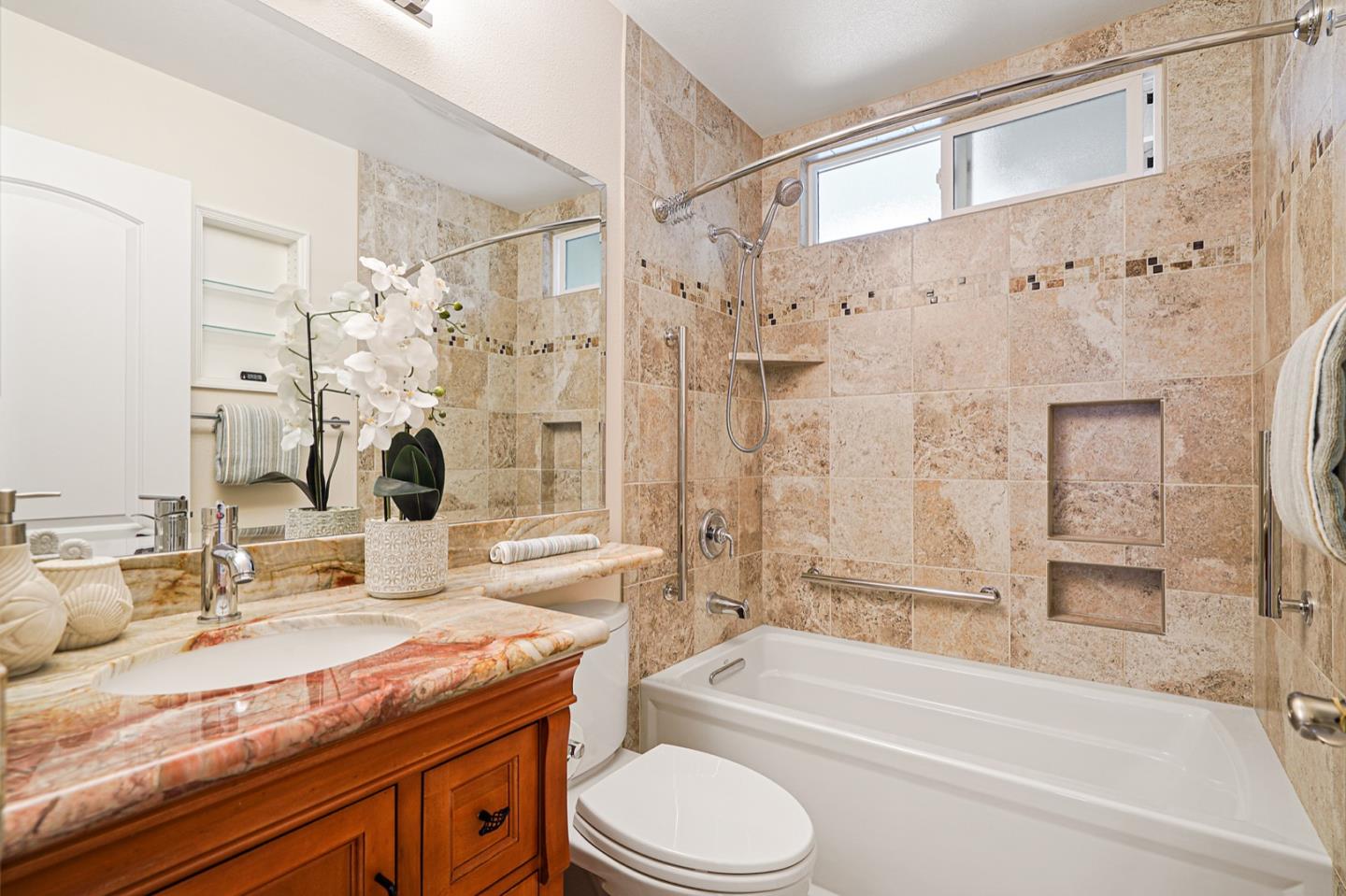 928 Lynn Court San Ramon, CA 94583 - Photo 24 of 43 a bathroom with a granite countertop sink toilet tub and shower