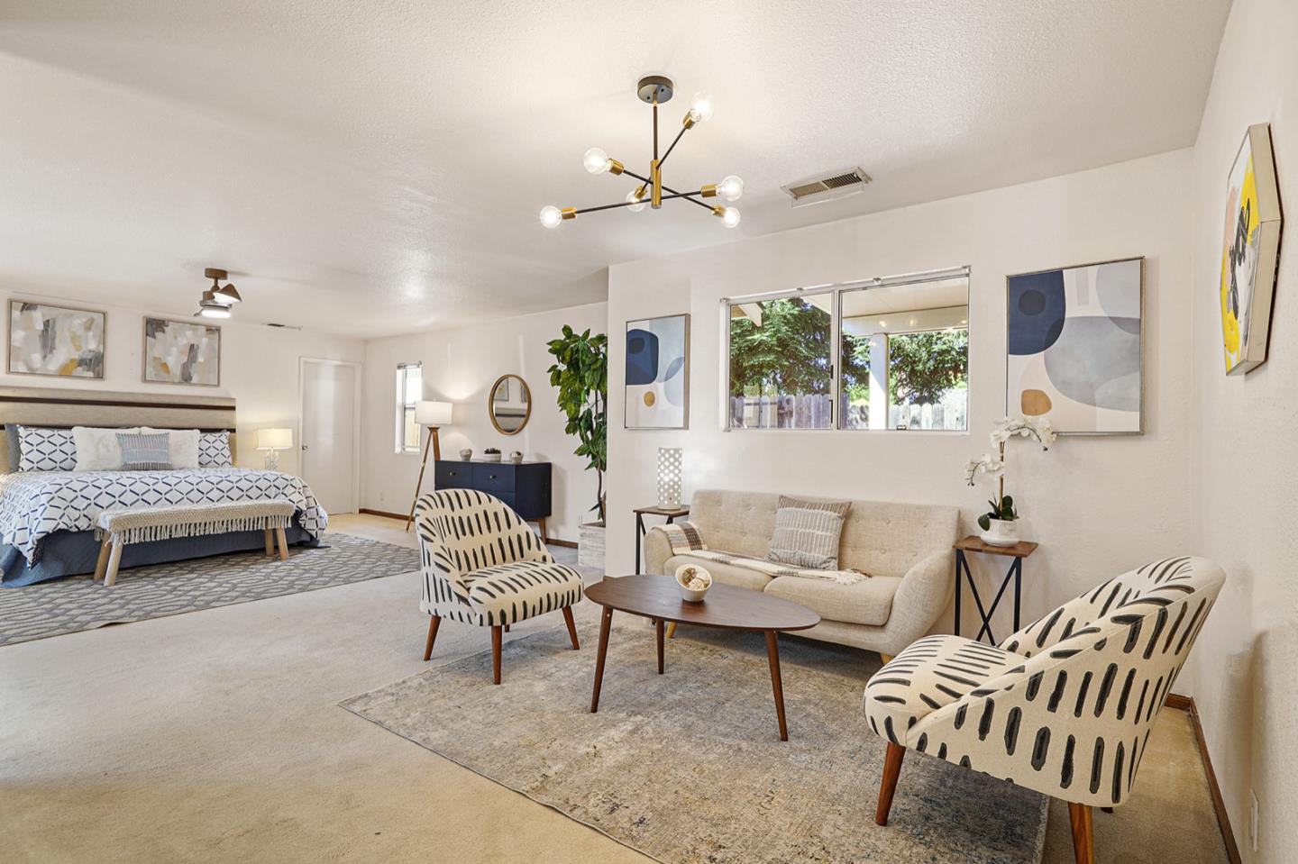 928 Lynn Court San Ramon, CA 94583 - Photo 27 of 43 a living room with furniture and a chandelier