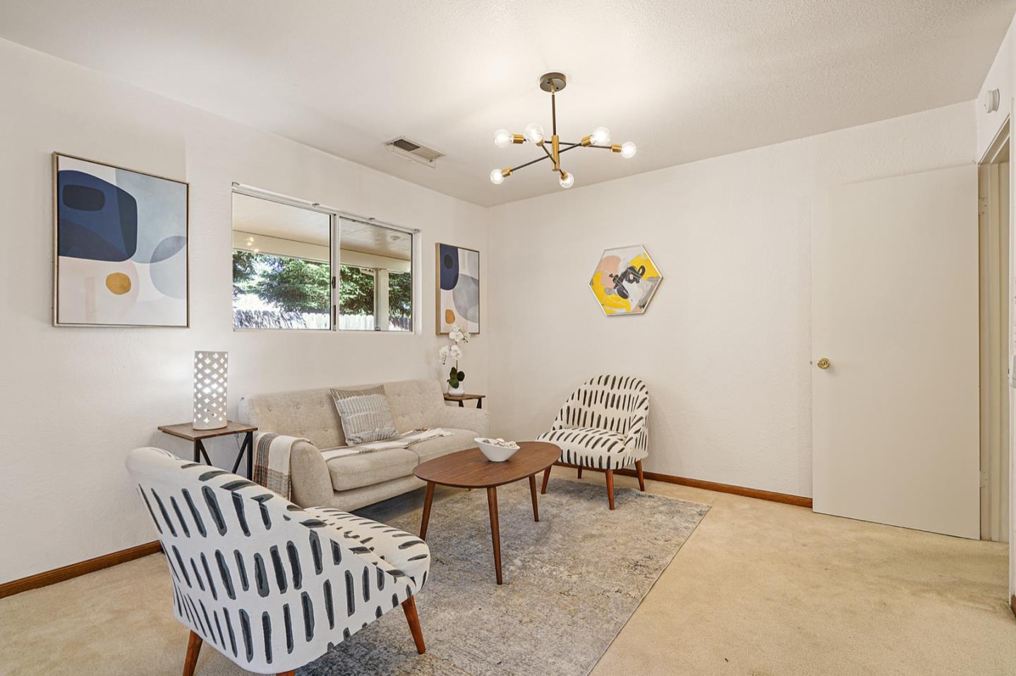 928 Lynn Court San Ramon, CA 94583 - Photo 28 of 43 a living room with furniture and painting on the wall