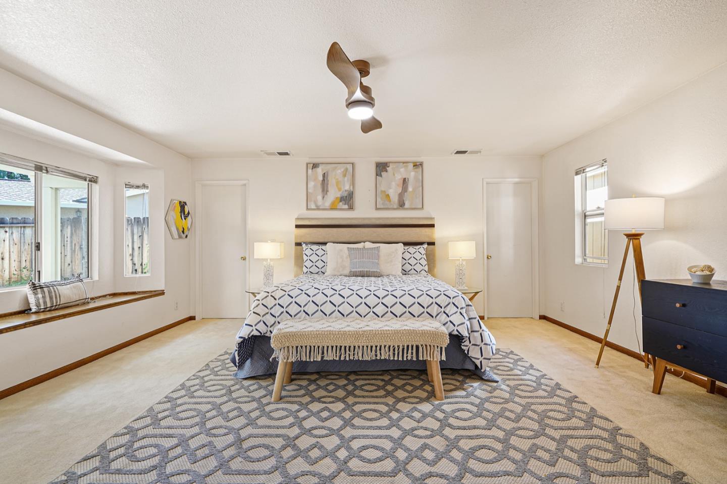 928 Lynn Court San Ramon, CA 94583 - Photo 33 of 43 a bedroom with a bed and wooden floor