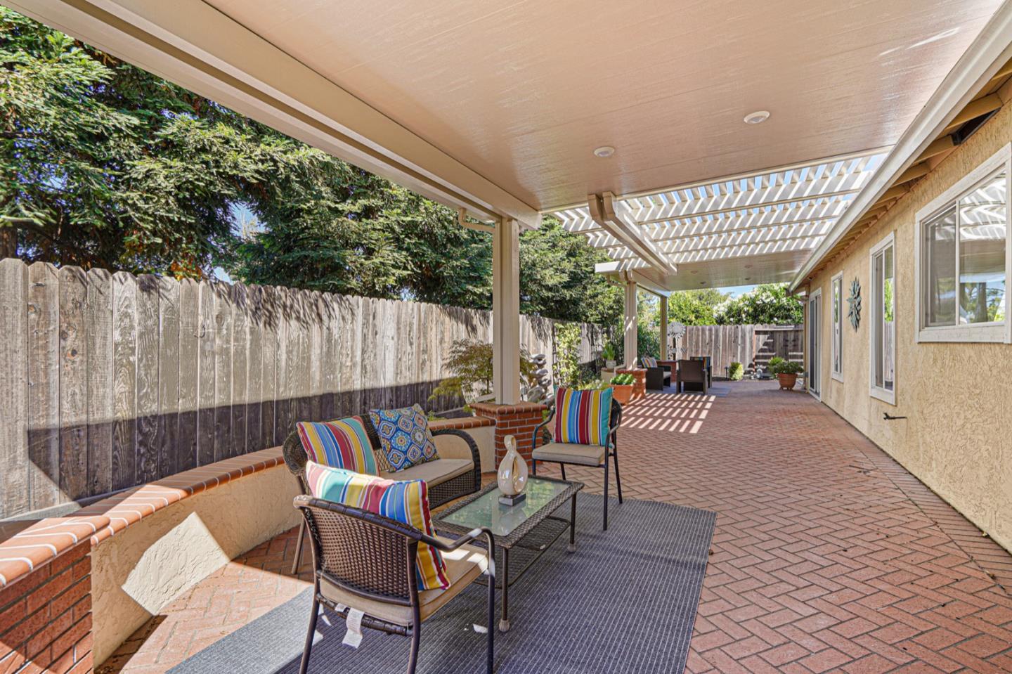 928 Lynn Court San Ramon, CA 94583 - Photo 38 of 43 a patio with glass top table and chairs