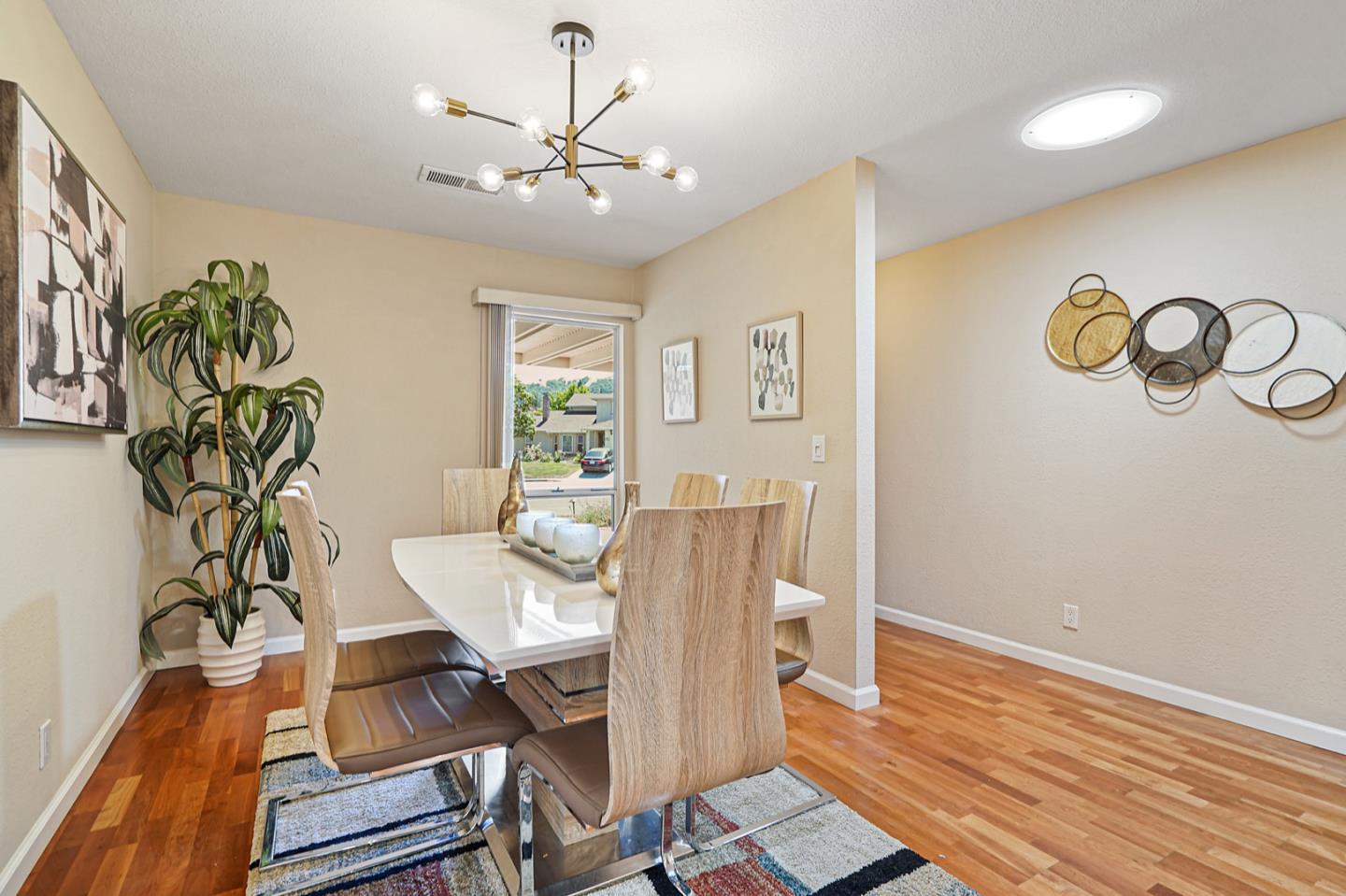 928 Lynn Court San Ramon, CA 94583 - Photo 4 of 43 a view of a dining room with furniture and wooden floor