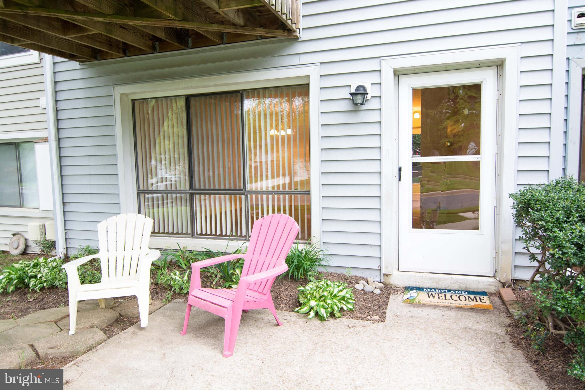 2221 Notely Lane Crofton, MD 21114 - Photo 1 of 26 a view of a porch with a bench