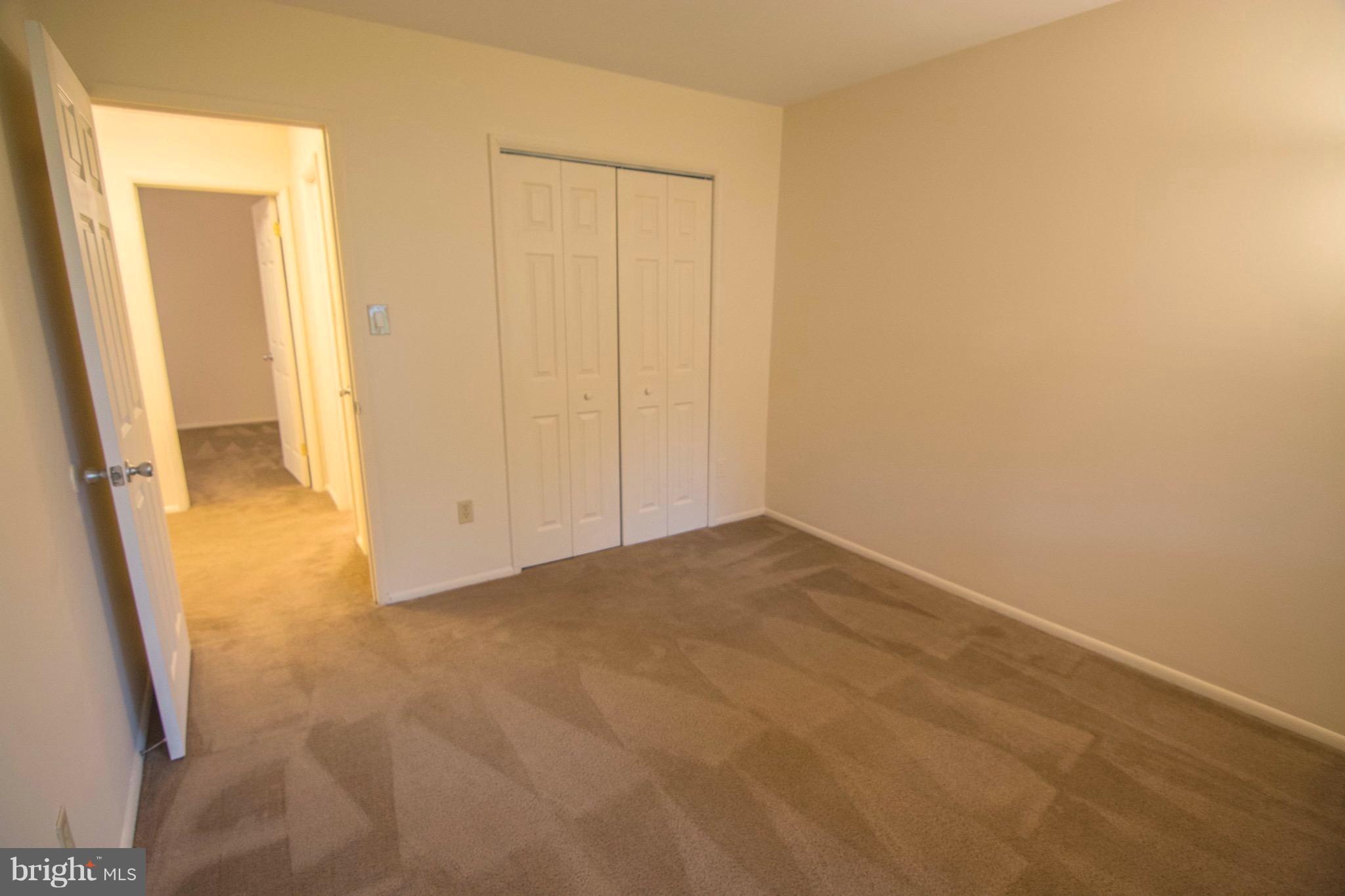 2221 Notely Lane Crofton, MD 21114 - Photo 19 of 26 an empty room with windows