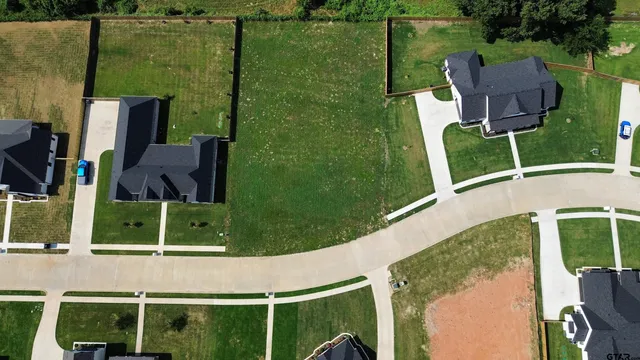 a view of a chairs and table in the balcony