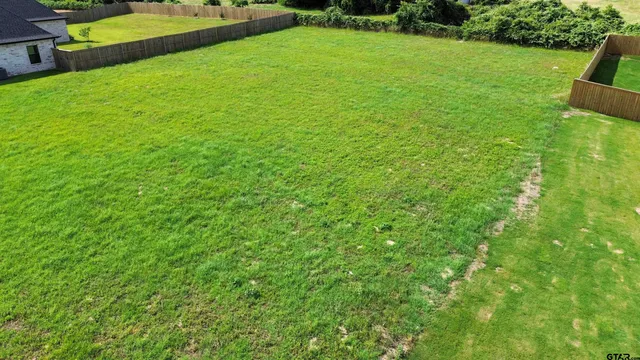 a view of a garden with a bench