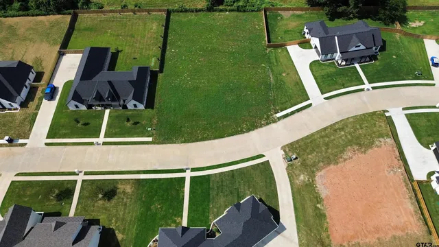 a view of a chairs and table in the patio