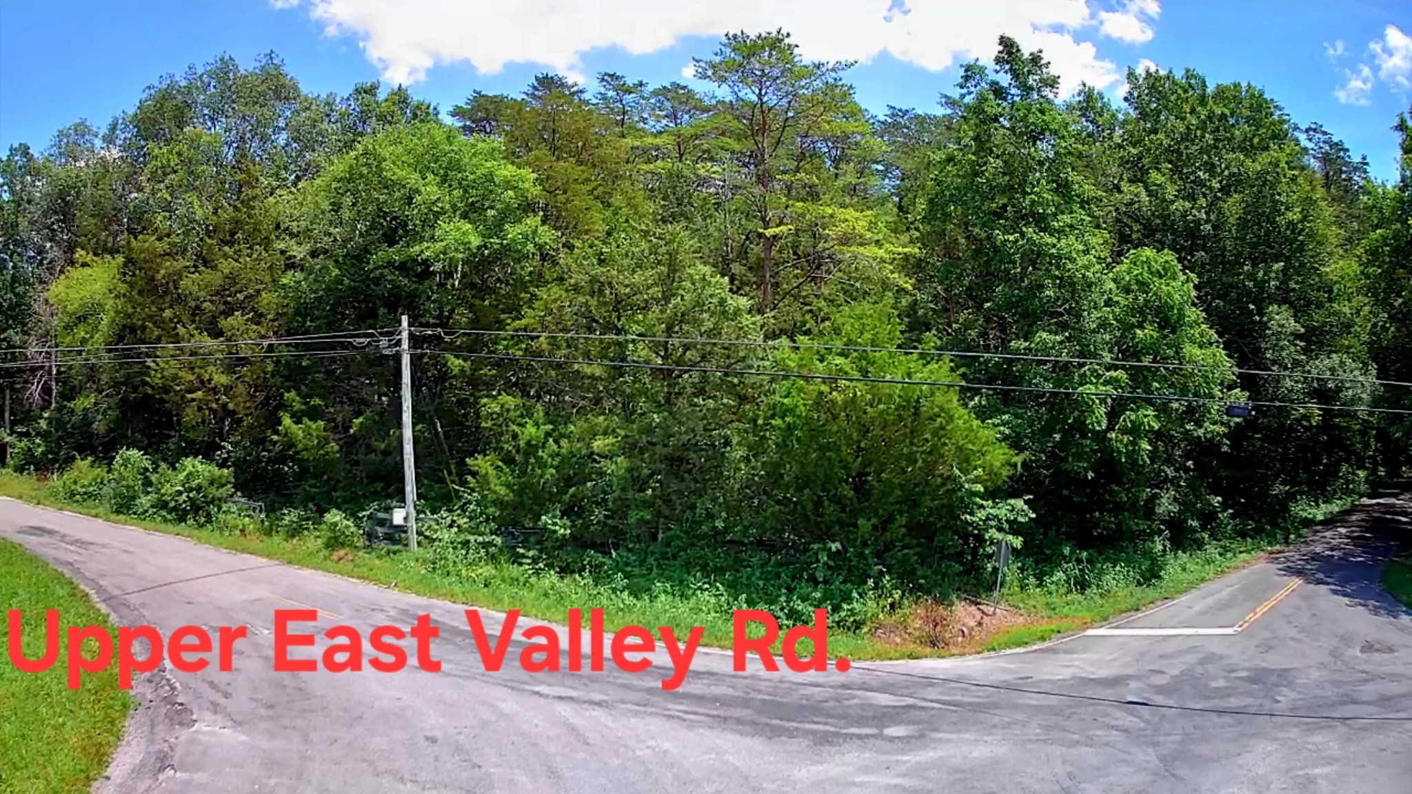 0 East Valley Road Pikeville, TN 37367 - Photo 4 of 18 a street sign that is sitting in the middle of a road