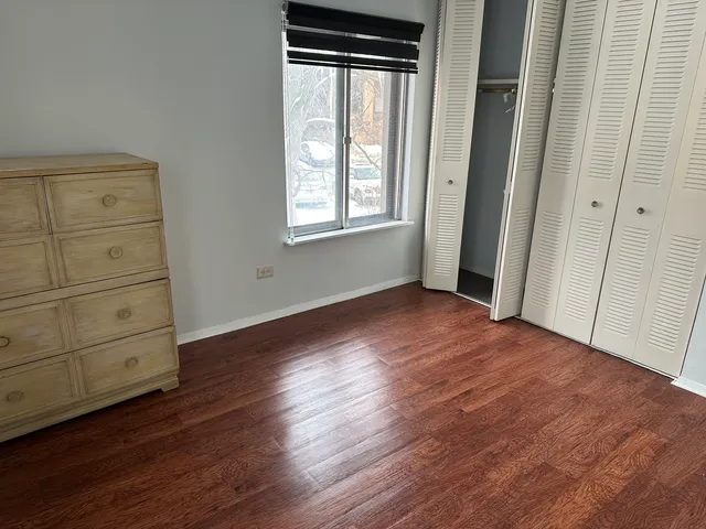 wooden floor and window in a room