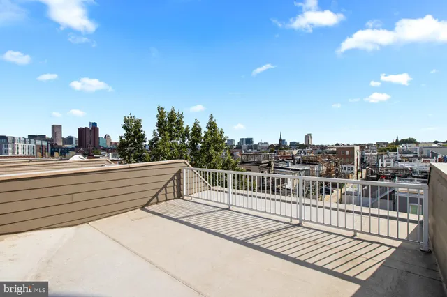 a view of a livingroom with wooden floor
