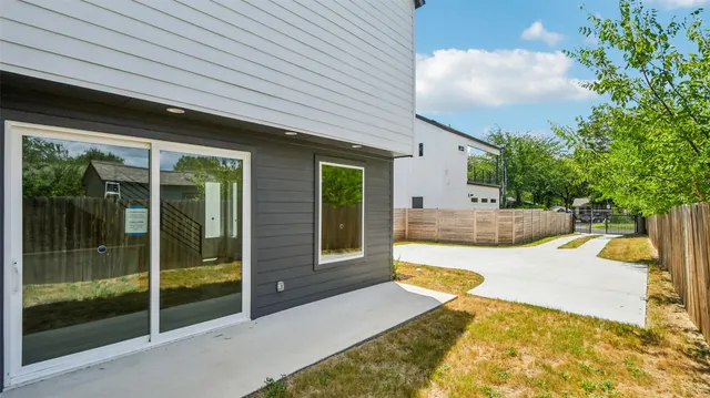 a view of a house with swimming pool and porch with furniture
