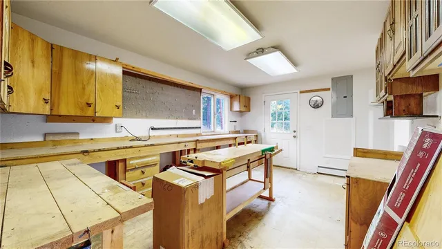 a aerial view of a house with a yard