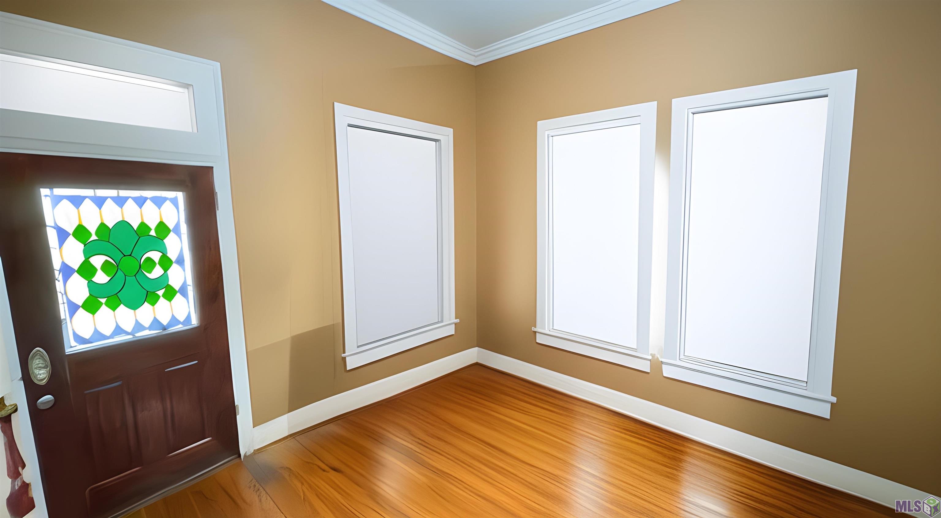 728 Europe Street Baton Rouge, LA 70802 - Photo 3 of 24 Living Room AI generated without furniture & drapes